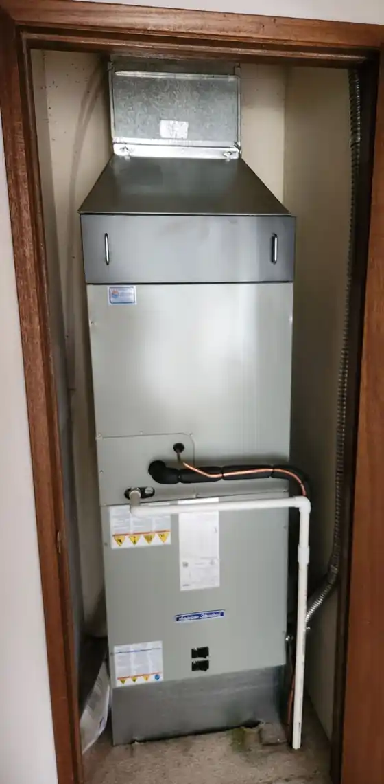 The new American Standard air handler installed in the same closet