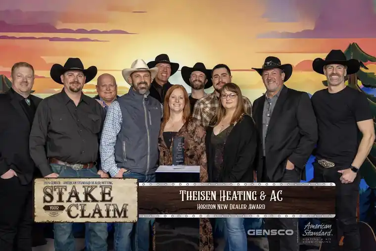 The Theisen team posed in front of the 2024 GENSCO and American Standard dealer meeting backdrop that names the Horizon New Dealer Award